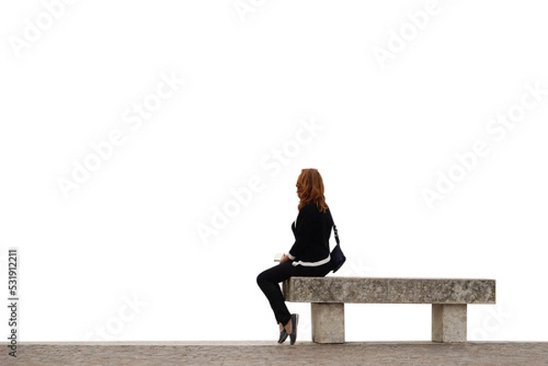 Fototapeta Bank. Meer. Frau. Einsam. auf dem Stein Pflaster am Meer sitzt eine Frau