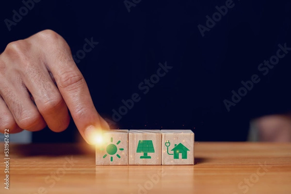 Fototapeta  Climate neutral long term strategy. Hand put wooden cubes with decrease carbon emission icon and green icon.Low carbon,carbon neutral concept. Green banner.
