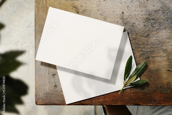 Fototapeta Clean minimal A5 flyer mockup on top table with plant