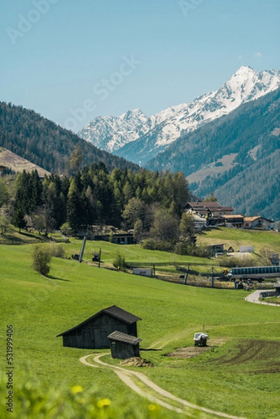 Obraz Austrian landscape village with alps on the background