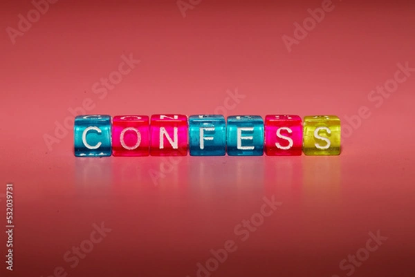 Fototapeta the word "confess" made up of cubes