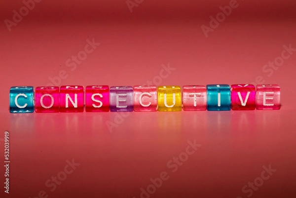 Fototapeta the word "consecutive" made up of cubes