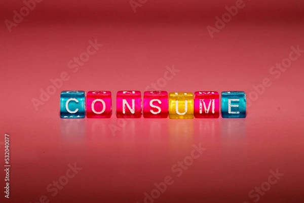 Fototapeta the word "consume" made up of cubes