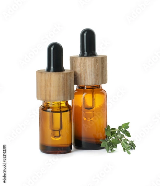 Obraz Bottles of essential oil and thyme isolated on white