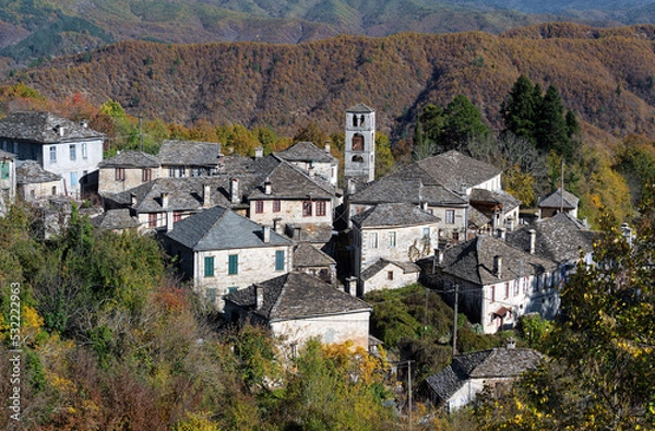 Obraz Autumnal landscape showing the stone houses of traditional architecture in the village of Dilofo in Epirus, Greece