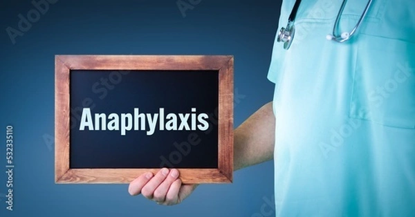 Fototapeta Anaphylaxis (anaphylactic shock). Doctor shows sign/board with wooden frame. Background blue