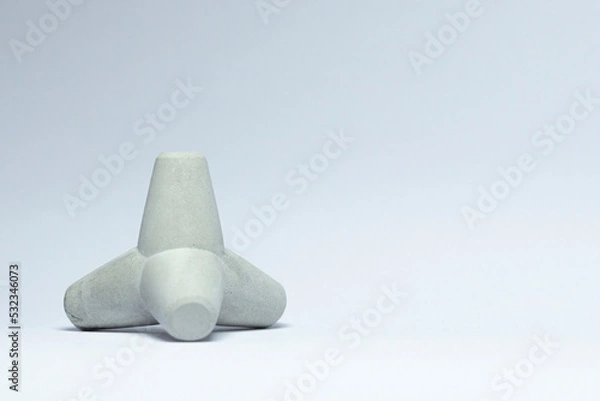 Fototapeta Concrete tetrapod breakwaters. Tetrapod model, design concept.