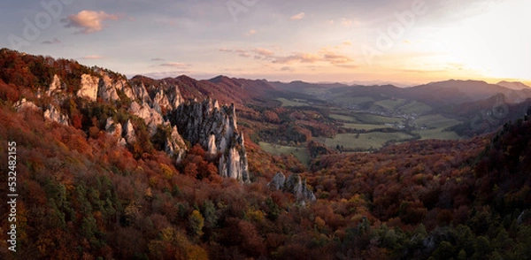 Fototapeta Wonderful autumn colors in Slovakia nature. Pure landscape photography of Sulov rocks during the golden hour. Sulovske skaly