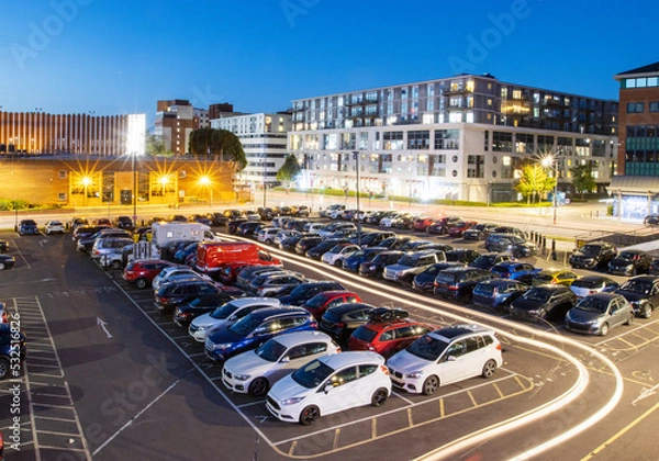 Fototapeta Aerial view of Princes Street Car illuminated at dusk with long exposure