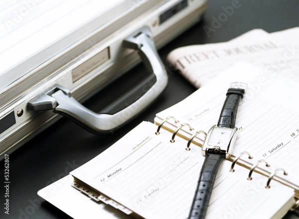 Obraz briefcase and wrist watch