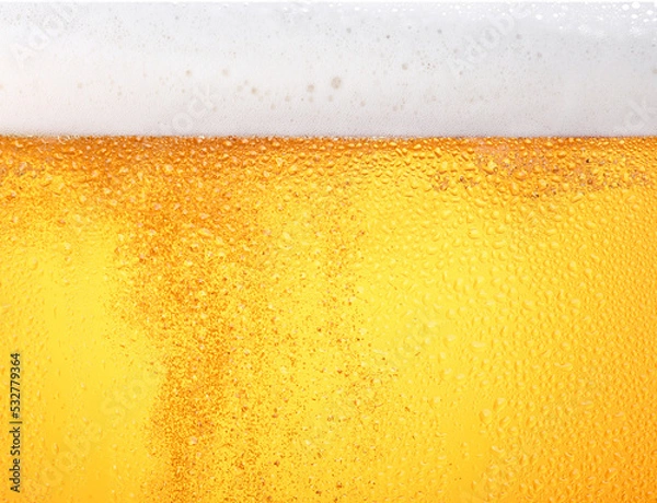 Obraz Close up background of beer with bubbles in glass