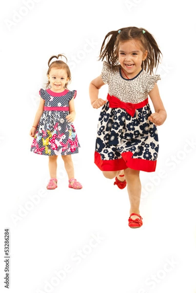 Fototapeta Competition of sisters running