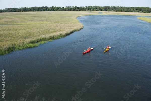 Obraz Two boys kayaking.