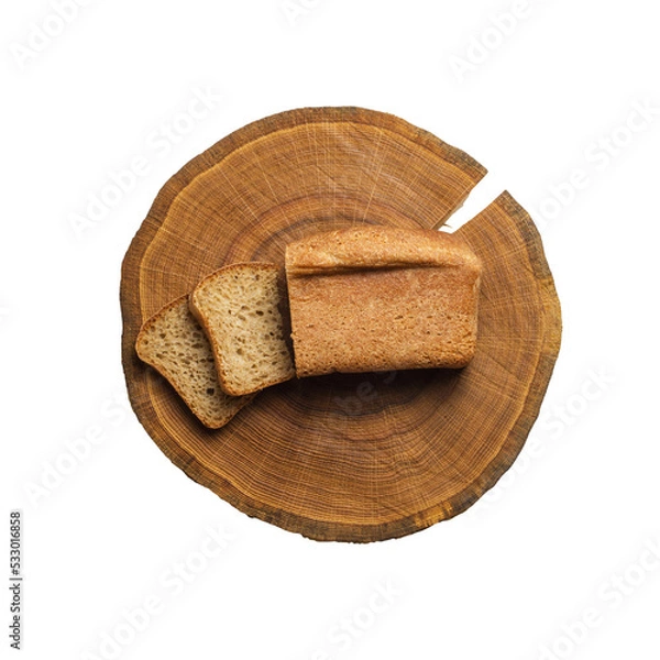 Fototapeta Bread on slice of wood