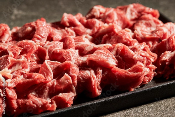 Obraz Thinly sliced raw meat, beef
