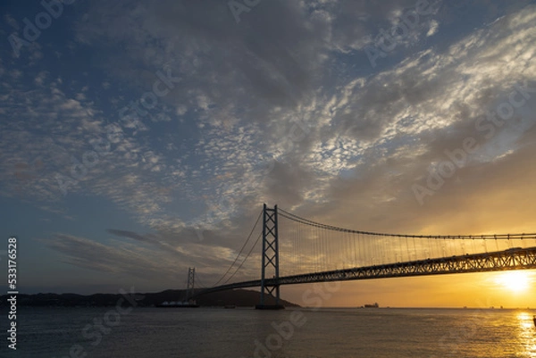 Fototapeta 明石海峡大橋と夕日