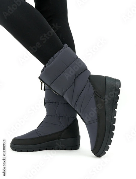 Fototapeta legs in gray shoes isolated on white background