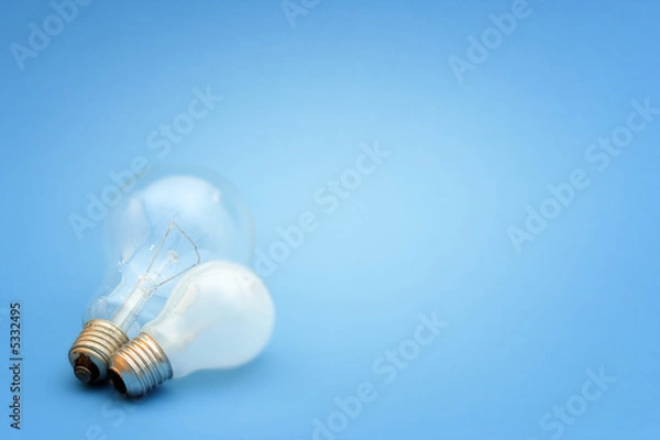 Fototapeta Background with lit lightbulb