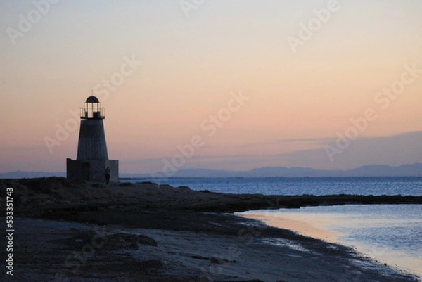 Fototapeta lighthouse at sunset