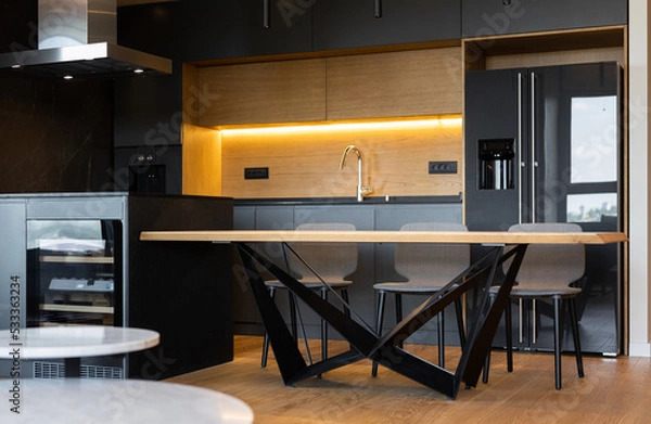 Obraz Kitchen interior with dining table in modern apartment