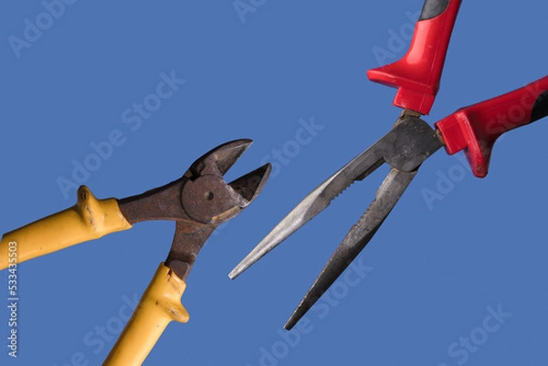 Obraz different cutting pliers, with blue background