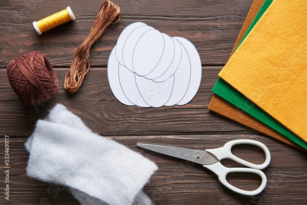 Fototapeta Step-by-step instructions for decorative crafts pumpkin made of felt for Halloween.