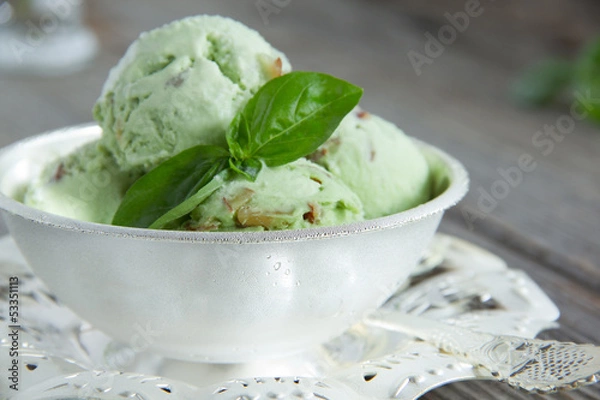 Obraz Green ice cream with basil, mint and nuts.