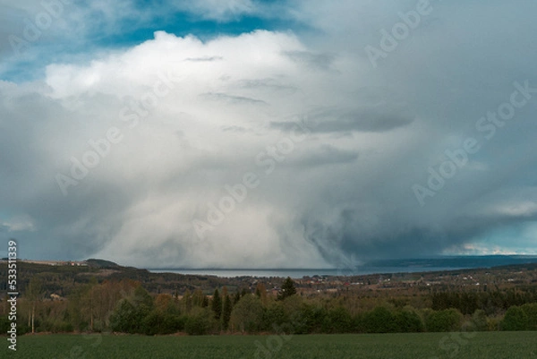 Fototapeta Stormy clouds above Lake Mjøsa.