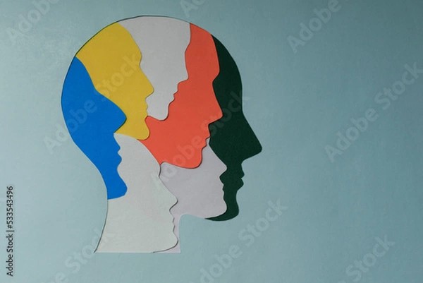 Obraz paper cut style Colored silhouette faces in head. Metaphor bipolar disorder,  Parkinson, Double face, Split personality, Psychology, Dual personality Mental health concept. Copy space.
