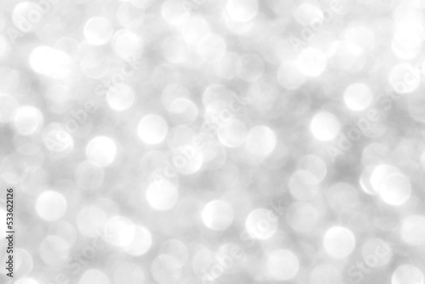 Obraz Abstract silver and white bokeh light shiny background. The concept of New Year, Christmas, Wedding anniversary, Winter and all celebration background concepts.	
