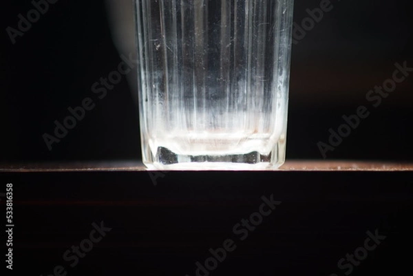 Obraz Under the bottom of the glass, sunlight passed down.