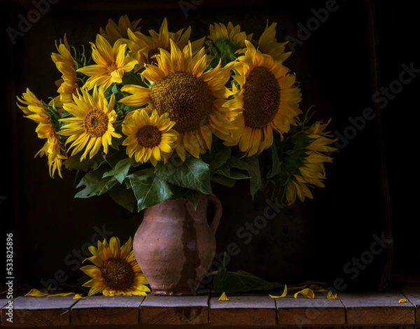 Fototapeta beautiful yellow Sunflower still life bouquet  in a clay jug ceramic rustic style oil honey Dark photo background wooden table Vintage. Retro. low key Autumn flowers.