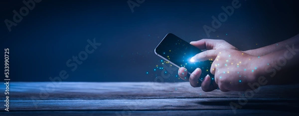 Obraz Hand typing smartphone with copy space for text. Touching cellphone idea for communication. Start up background for web banner.