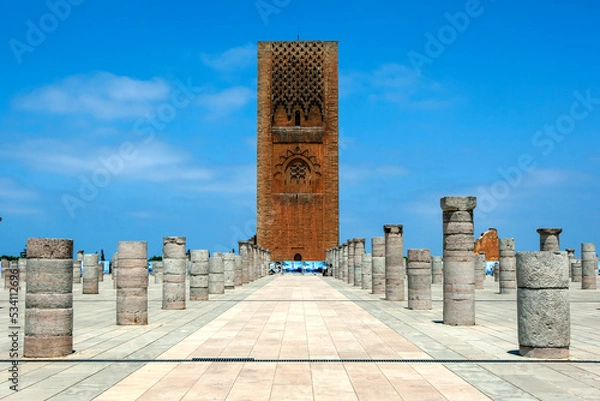 Fototapeta The magnificent Hassan Tower and stone columns at Rabat in Morocco. The tower is the incomplete red sandstone minaret of a mosque began in 1195.