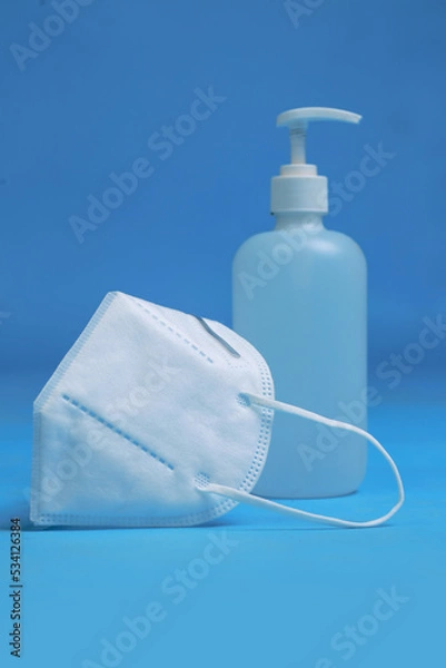 Fototapeta medical masks and antiseptic bottles for protection from pandemics germs and viruses
