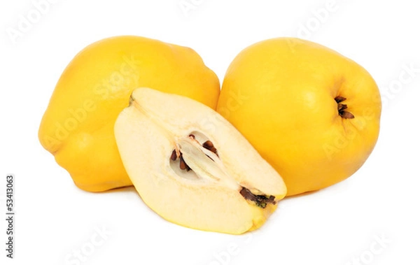 Fototapeta Two whole and a piece of ripe quince