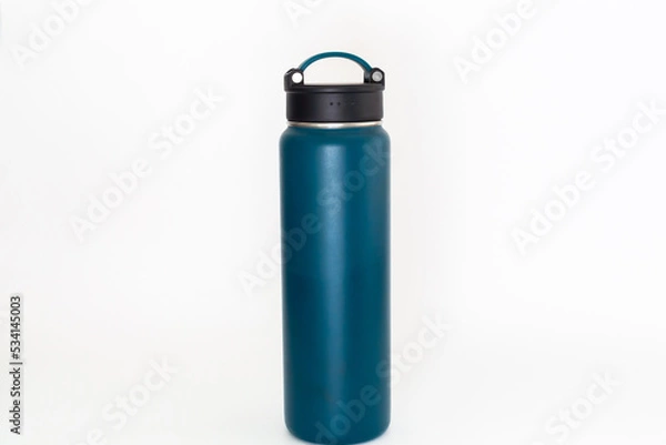Obraz Blue thermos, isolated on white background.