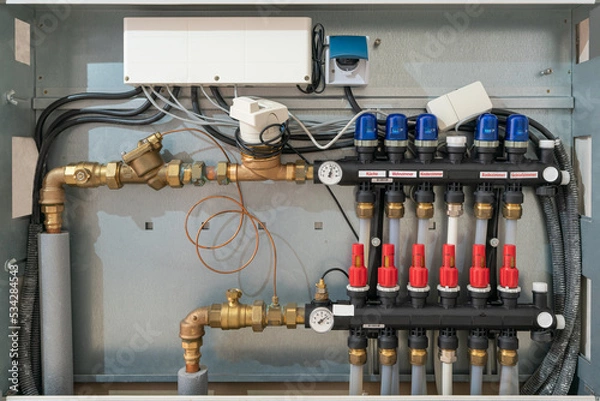 Fototapeta Energieeinsparung durch den hydraulischen Abgleich am Heizkreisverteiler der Fußbodenheizung.
