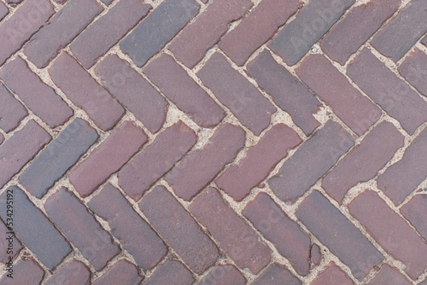 Fototapeta fragment of the road from paving slabs