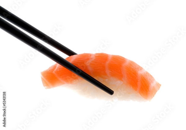 Obraz Sushi pałeczkami nakręcony na białym tle.