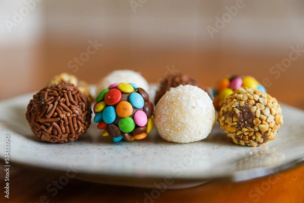 Obraz Table with brigadeiro and various party sweets. Image with selective focus
