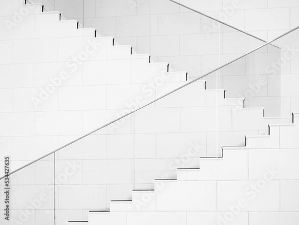 Fototapeta White stairs with glass railing Modern building Minimal Architecture details