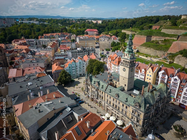 Fototapeta Kłodzko - a city situated in the mountains. Sunny day and clouds in the blue sky in the mountains.