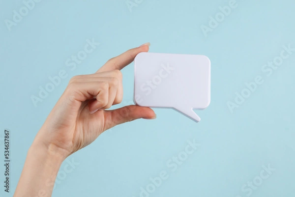 Fototapeta Empty white speech bubble on a blue background