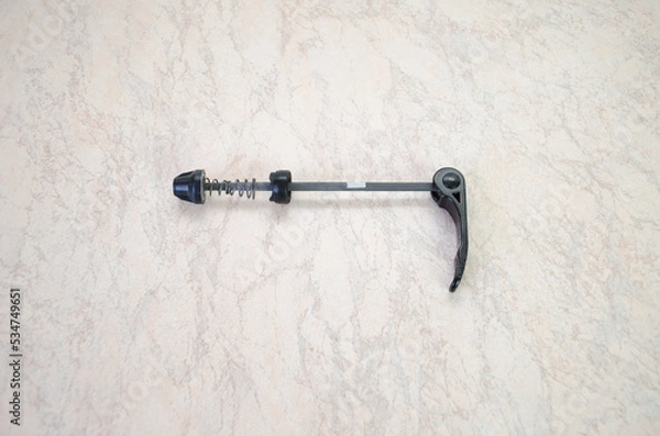 Obraz Bicycle wheel eccentric clamp close-up