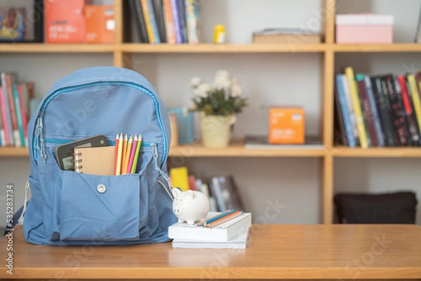 Obraz School bag with education accessory provide for back to school concept
