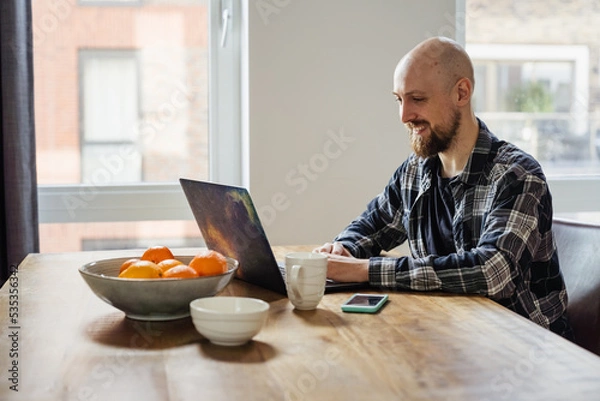 Obraz Stay home young man works from home. peoples were advised not to go to the office and work from home