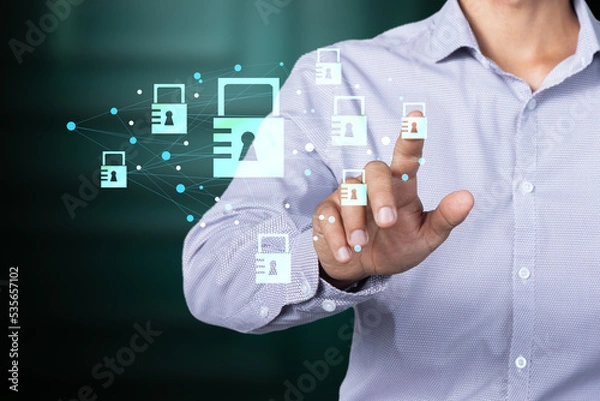 Fototapeta Man pressing virtual locks