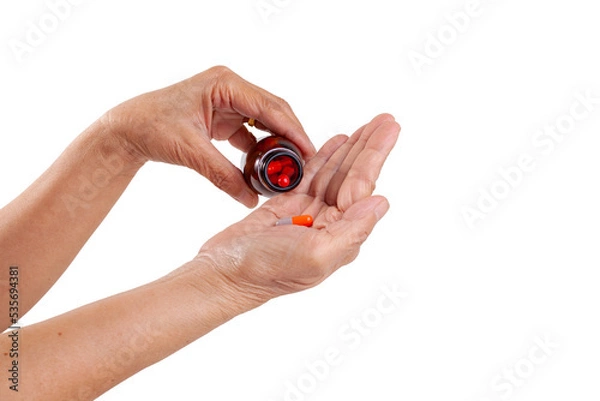 Obraz hand holding pills bottle
