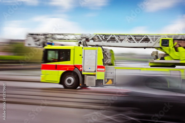 Obraz Feuerwehrauto auf Einsatzfahrt